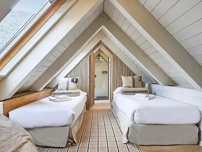 Cama o camas de una habitación en Luderna - Tríplex Val de Ruda C305