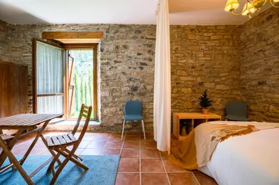 Cama o camas de una habitación en El Molino de Castiello de Jaca