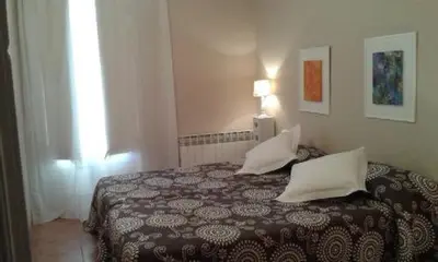 Cama o camas de una habitación en Ca la tieta Quima