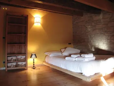 Cama o camas de una habitación en L'Esgolfa de ca l'Ortís
