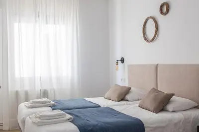 Cama o camas de una habitación en El Canónigo Bardenas