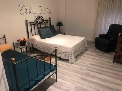 Cama o camas de una habitación en Loft LVU en Zaragoza
