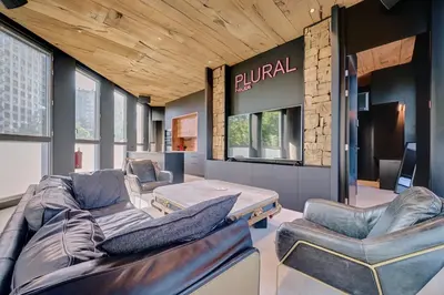 Zona de estar de Apartamento Plural by Clabao