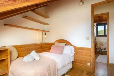 Cama o camas de una habitación en Alojamiento la Atalaya de Araguas