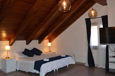 Cama o camas de una habitación en NRY ESTANCES I SERVEIS EL TARTER 2