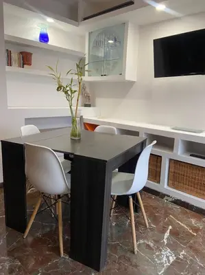 Una televisión o centro de entretenimiento en Casa Carlos