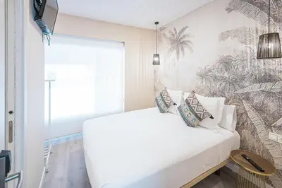 Cama o camas de una habitación en Hostal Plaza Boutique - Solo adultos