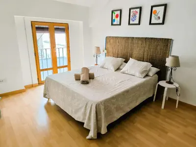 Cama o camas de una habitación en El Loft del Casco by Alogest