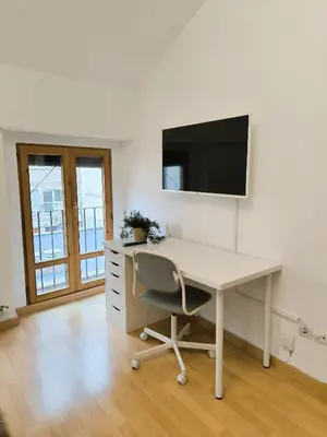 Una televisión o centro de entretenimiento en El Loft del Casco by Alogest