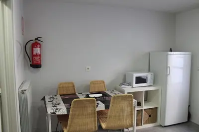 Una televisión o centro de entretenimiento en Apartamento Castillo de Arguedas