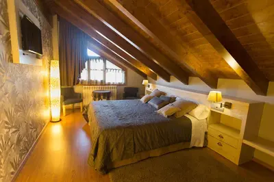Cama o camas de una habitación en Apartamentos El Rincón de Benás