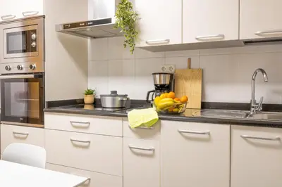 Una cocina o zona de cocina en Los Sauces Pamplona Hospitales Universidad