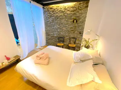 Cama o camas de una habitación en Paller rústic de muntanya amb estil i acollidor by RURAL D'ÀNEU