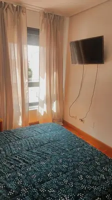 Cama o camas de una habitación en Habitación Renfe