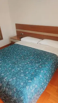 Cama o camas de una habitación en Habitación Renfe