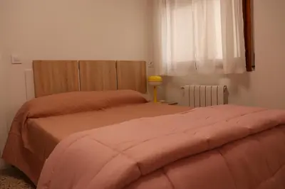 Cama o camas de una habitación en Apartamento El Mercado