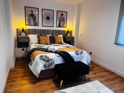 Cama o camas de una habitación en La Plaza del Pilar