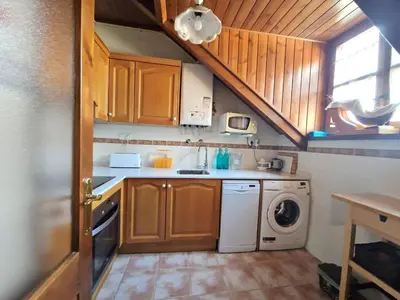 Una cocina o zona de cocina en Dúplex familiar i amb vistes al centre d’Esterri by RURAL D'ÀNEU