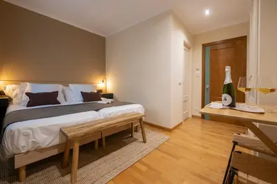 Cama o camas de una habitación en Hotel Siuranella