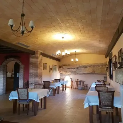 Un restaurante o sitio para comer en La Contrada