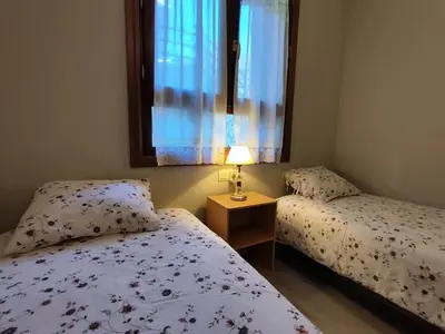 Cama o camas de una habitación en Boira, ideal familias, preciosas vistas, garaje incluido