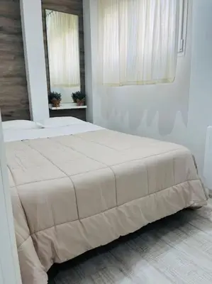 Cama o camas de una habitación en El Jardín de Paula