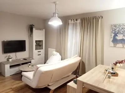Una televisión o centro de entretenimiento en Apartamento CIR