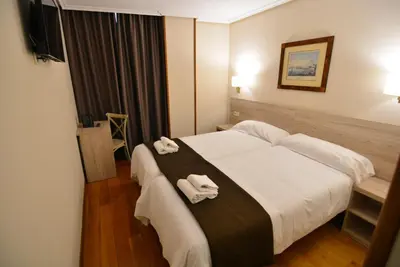 Cama o camas de una habitación en Hotel Rooms Ducay