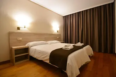 Cama o camas de una habitación en Hotel Rooms Ducay