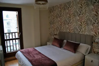 Cama o camas de una habitación en La Casa de la Montaña