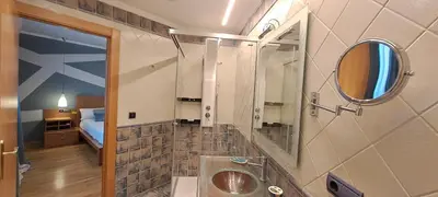 Un baño de Dúplex Luxury Alfaro