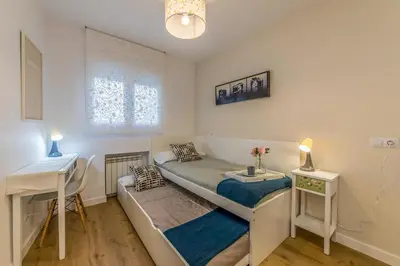 Cama o camas de una habitación en Apartamento con terraza
