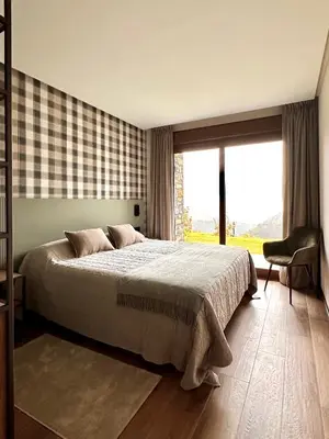 Cama o camas de una habitación en BOJ Casas de Montaña
