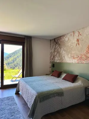Cama o camas de una habitación en BOJ Casas de Montaña