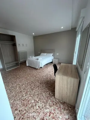 Cama o camas de una habitación en Pensión Arnedo