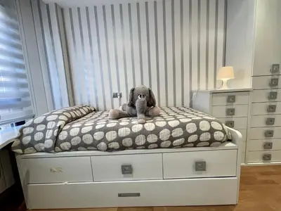 Cama o camas de una habitación en Apartamentos Ciudad del Calzado