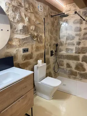 Un baño de Loft con encanto Casa Paquita