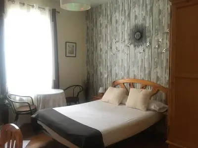 Cama o camas de una habitación en Pensión Leyre