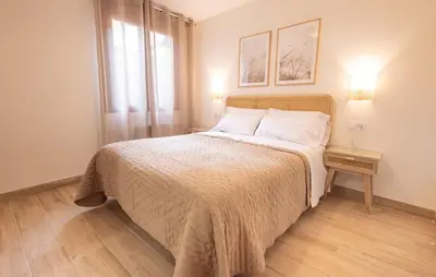 Cama o camas de una habitación en El sueño del Búho 5. Un dormitorio con chimenea