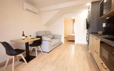 Zona de estar de El sueño del Búho 5. Un dormitorio con chimenea