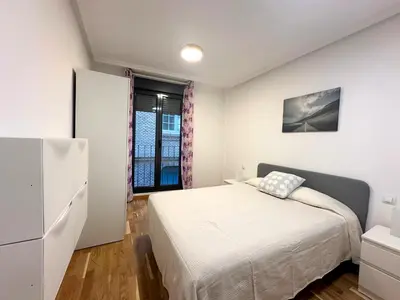 Cama o camas de una habitación en Dos Torres César Augusto - Larga temporada