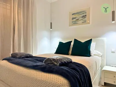 Cama o camas de una habitación en Dos Torres Tranvía