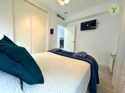 Cama o camas de una habitación en Dos Torres Tranvía