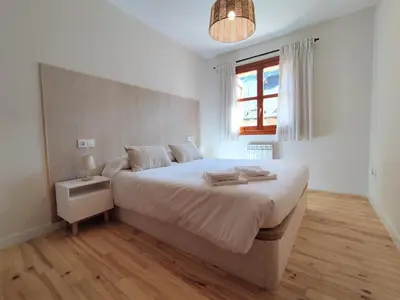 Cama o camas de una habitación en CHECK-IN CASAS Ixarso