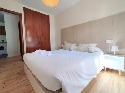 Cama o camas de una habitación en CHECK-IN CASAS Ixarso