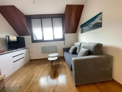 Una televisión o centro de entretenimiento en Apartamento Alba4