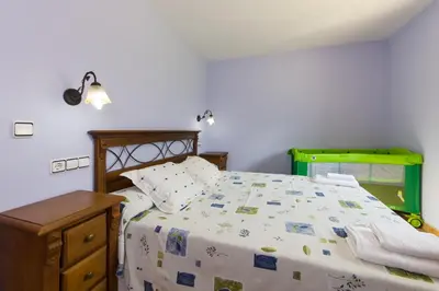Cama o camas de una habitación en Casa Soltero Apartamentos