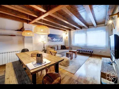 Una televisión o centro de entretenimiento en CASA GIRETA de Alma de Nieve