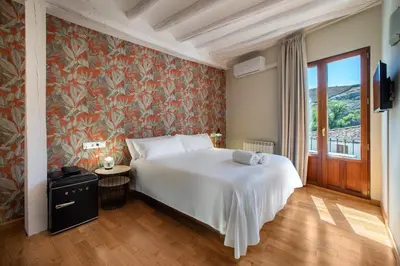 Cama o camas de una habitación en Hotel-Boutique by Gonzalo Sesma