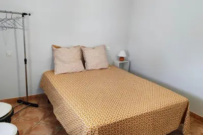 Cama o camas de una habitación en Casa Bretalunya
